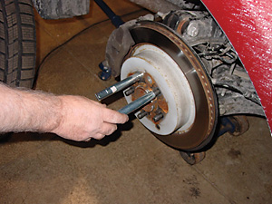 step 1 in using the wheel mounting alignment tool